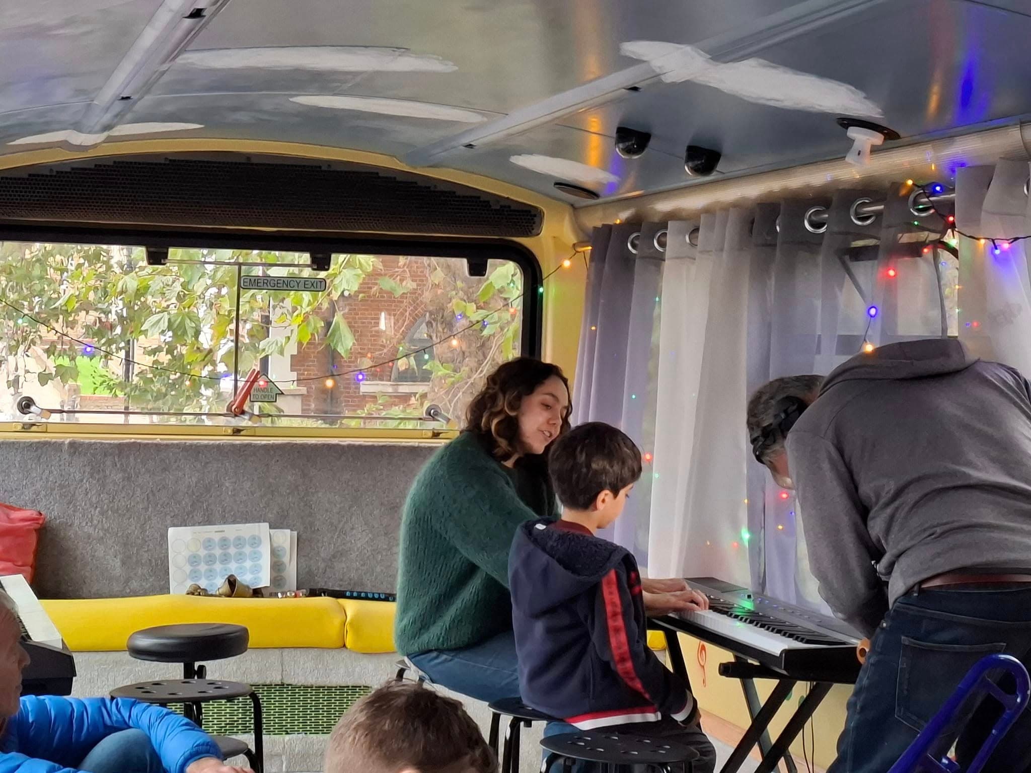 Child learning keyboard with a tutor